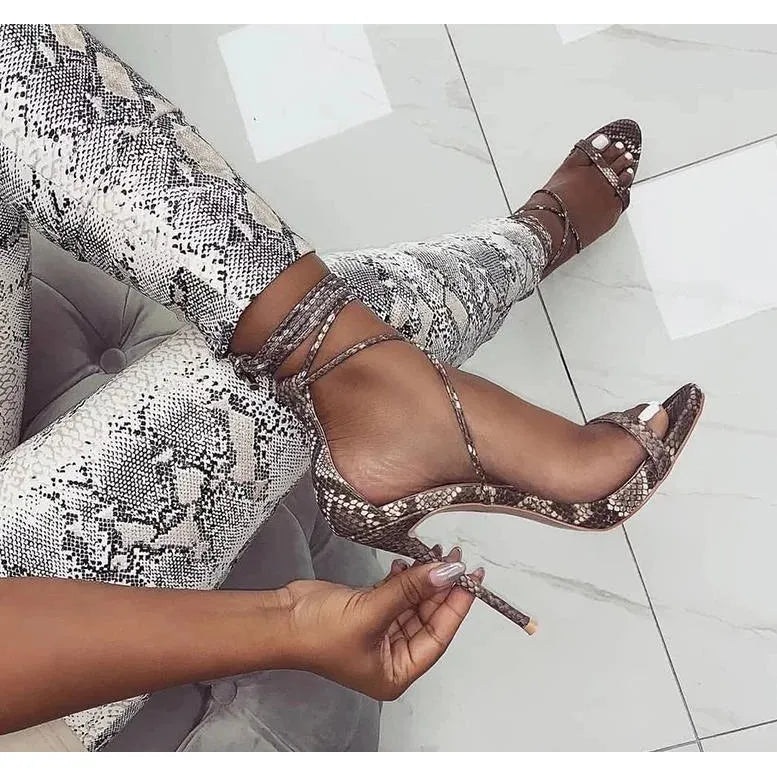 The Renee Snakeskin High Heel Pumps