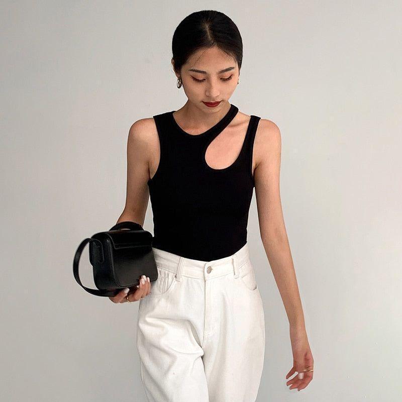 Forbidden Asymmetric Cut Out Top