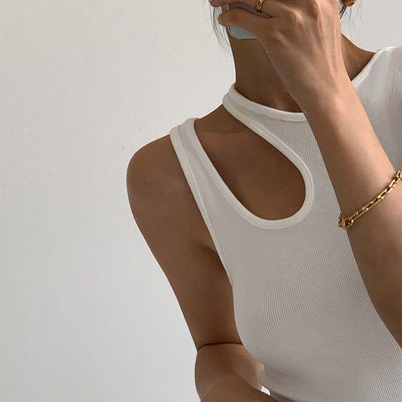 Forbidden Asymmetric Cut Out Top